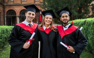 three-college-graduates-standing